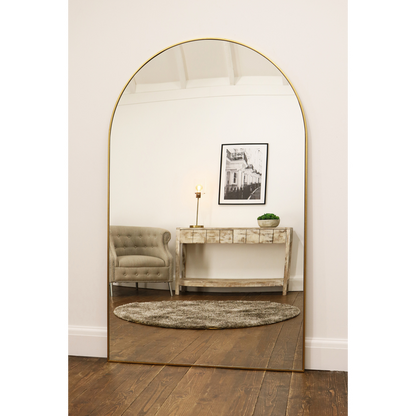 Gold Full Length Arched Metal Mirror as a lounge lean to